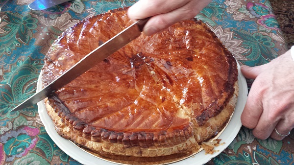 Galette des Rois... actually, a "Pithivier," according to Callaghan. The traditional King's Cakes are this, but thinner... quite different from the King Cakes Americans have at Mardi Gras.