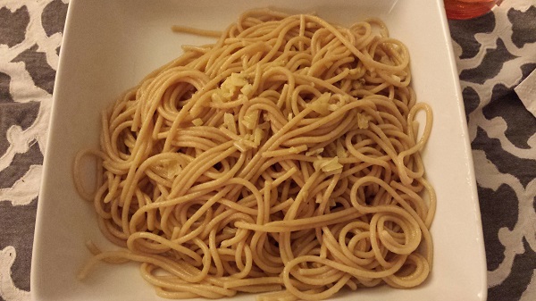 Whole wheat spaghetti with olive oil, fresh garlic and coarsely ground sea salt.